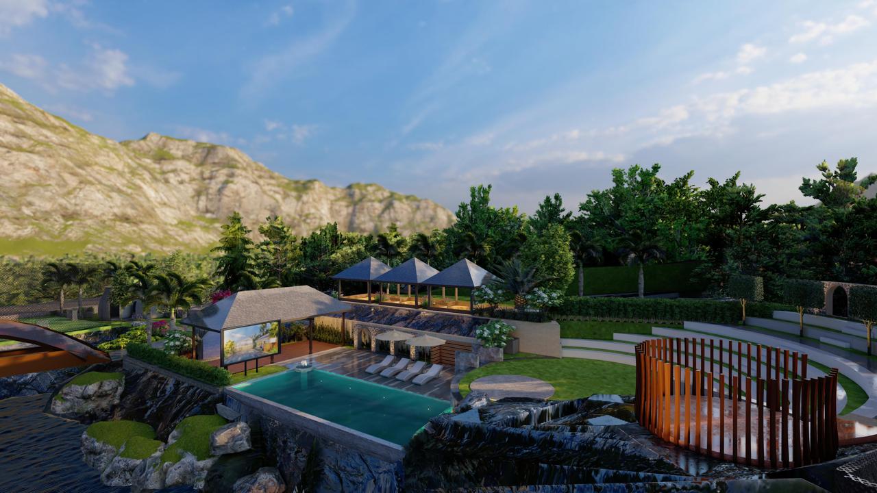 Hotel lounge area with a sofa and chairs overlooking a city skyline